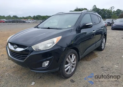 2012 Hyundai Tucson Limited from USA, damaged, VIN KM8JUCAC7CU541123